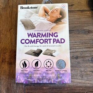 NEW Brookstone  Warming Comfort Pad